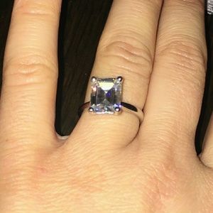 3.5 ct C+C Emerald cut Moissanite engagement ring.